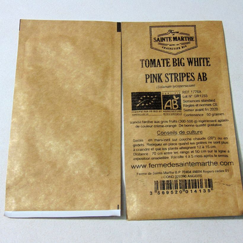 Beispiel eines Exemplars von Tomate Big White Pink Stripes Bio die Tüte mit 50 Samen wie geliefert