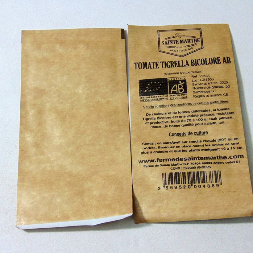 Beispiel eines Exemplars von Tomate Tigerella bicolore Bio die Tüte mit 50 Samen wie geliefert